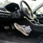 Person with neuropathy safely driving a car