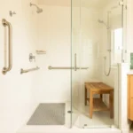 Accessible bathroom with grab bars, non-slip mat, and shower bench for neuropathy safety