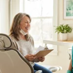 Neuropathy patient having a preparatory conversation with a dental hygienist before her cleaning appointment